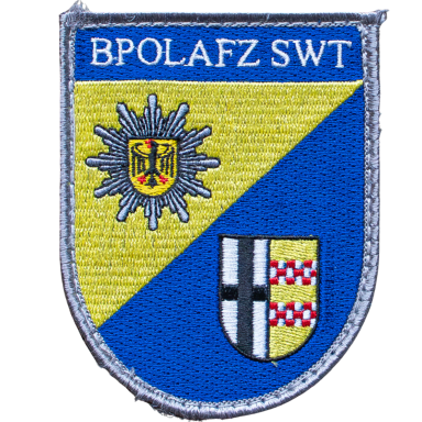 Abzeichen der Bundespolizei, Blau-Gelb mit Wappen und Sonnenemblem.