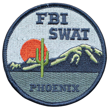 Abzeichen des FBI SWAT, mit einem Kaktus vor einem Sonnenuntergang in Phoenix.