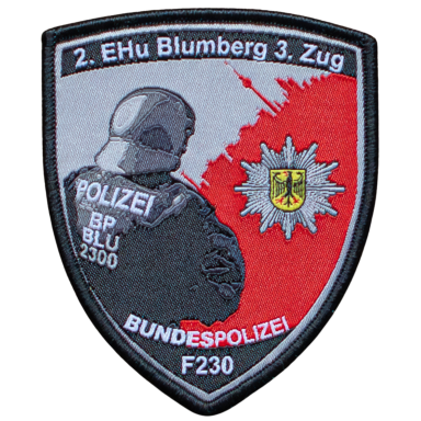 Abzeichen der Bundespolizei mit schwarz-weißer Silhouette eines Polizisten und Wappen.