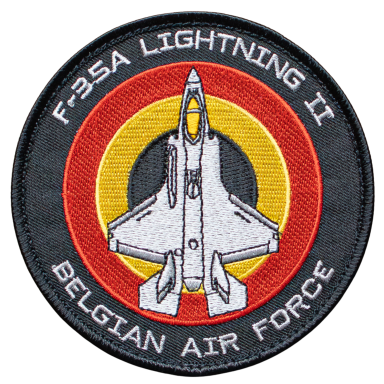 Abzeichen der belgischen Luftwaffe mit F-35A Lightning II und farbigen Ringen.