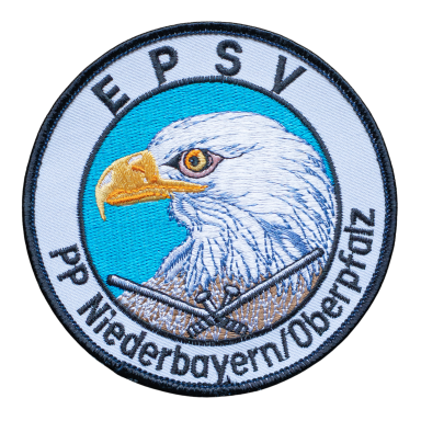Wappen mit einem Adlerkopf und gekreuzten Gewehren, beschriftet mit EPSV.