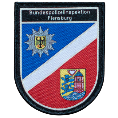 Wappen der Bundespolizeiinspektion Flensburg mit blauem und rotem Hintergrund.