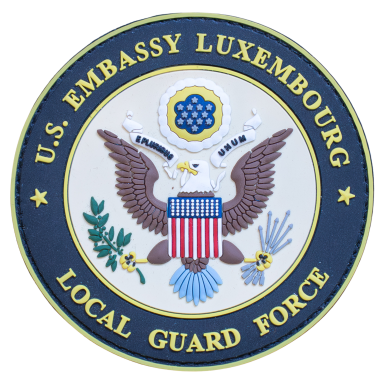 US-Botschaft Luxemburg - Wachdienst Dienstabzeichen der US-Botschaft Luxemburg, mit Adler und Symbolen.