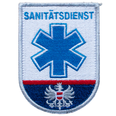 Abzeichen des Sanitätsdienstes mit einem roten Kreuz und einem Wappen darunter.