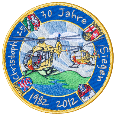 Emblem zum 30-jährigen Jubiläum des Christoph 25 mit zwei Hubschraubern.