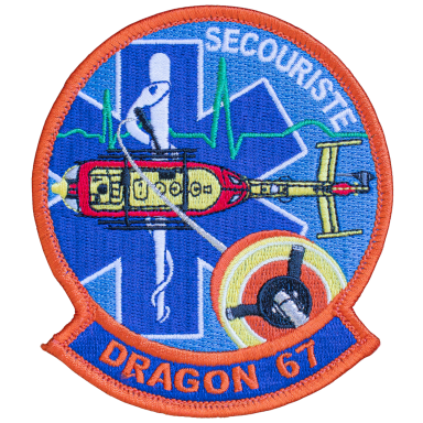 Dragon 67 - Secouriste Abzeichen der SECURISTE DRAGON 67 mit einer Rettungshelikopter-Illustration.