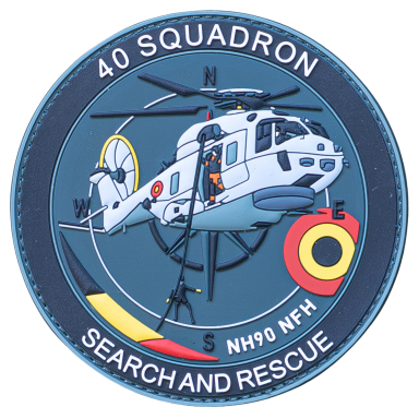 Wappen des 40. Geschwaders mit einem Such- und Rettungshubschrauber.