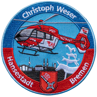 Abzeichen von Christoph Weser mit Hubschrauber und der Silhouette von Bremen.