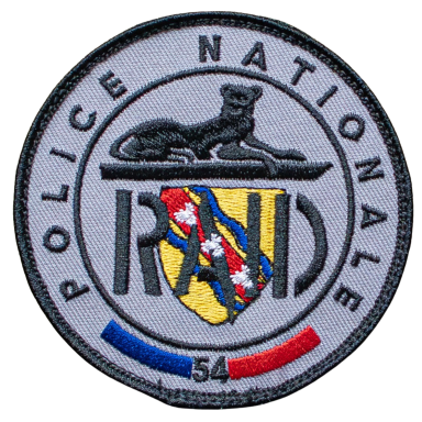 Abzeichen der französischen Polizei mit einem Luchs und dem Schriftzug "RAID".