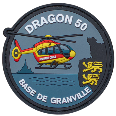 Abzeichen mit einem Hubschrauber über Wasser und dem Text "DRAGON 50, BASE DE GRANVILLE".