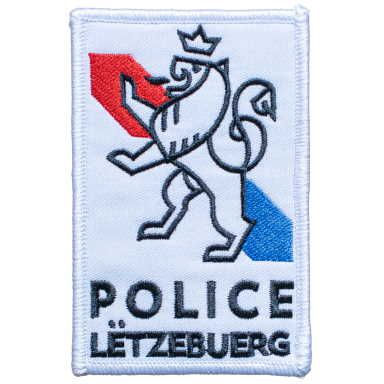 Wappen der Polizei Lëtzebuerg mit Löwen und den Farben Rot und Blau.