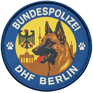 Abzeichen der Bundespolizei Berlin mit Hund und Berliner Wahrzeichen.