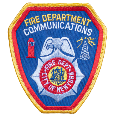 FDNY - Communications Abzeichen der Feuerwehrkommunikation der Stadt New York mit Symbolen für Feuerwehr und Kommunikation.
