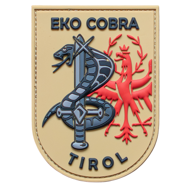 Abzeichen der EKO Cobra Tirol mit Schlange und Schwert auf beigem Hintergrund.