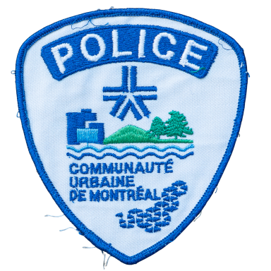Wappen der Polizei von Montreal mit blauen und weißen Farben und urbanem Motiv.