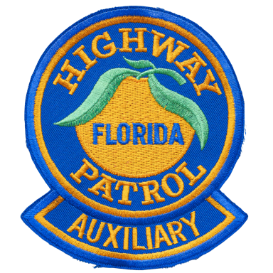 Abzeichen der Florida Highway Patrol Auxiliary mit orangefarbener Orange und Blättern.
