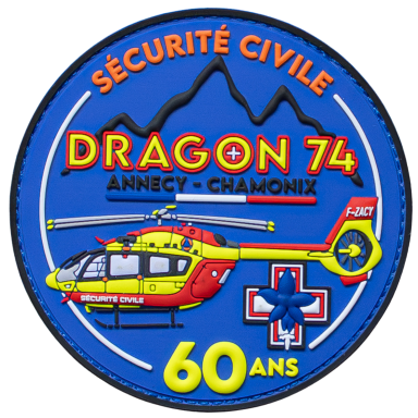 Abzeichen der Sicherheitszentrale Dragon 74 mit einem gelben Hubschrauber und rotem Kreuz.