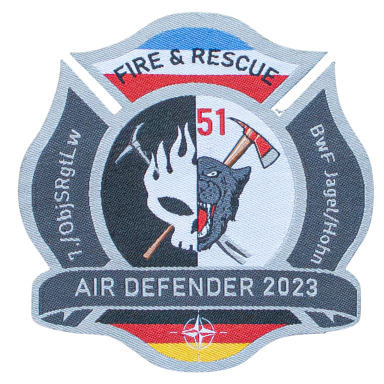 Abzeichen mit einem Feuerwehr- und Rettungssymbol, Jahr 2023, Titel "Air Defender".