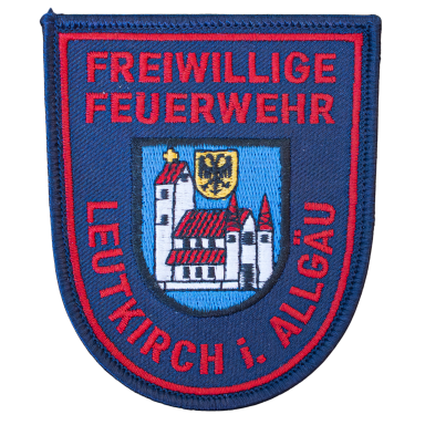 Abzeichen der Freiwilligen Feuerwehr Leutkirch im Allgäu mit Wappen und Stadtansicht.