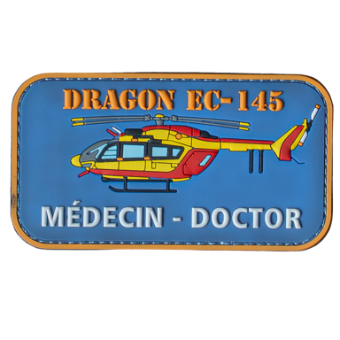 Buntes Emblem eines Hubschraubers mit dem Text "DRAGON EC-145 MÉDECIN - DOCTOR".