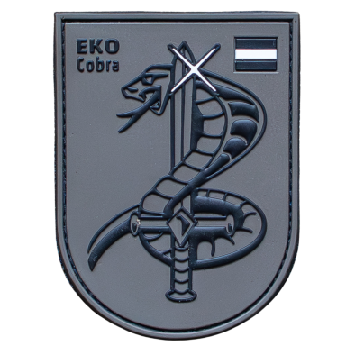 Abzeichen der EKO Cobra mit einer Schlange und einem Schwert auf grauem Hintergrund.