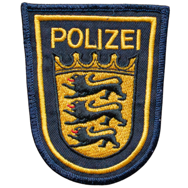 Wappen der Polizei mit drei Löwen und einer Krone, in Blau und Gold.