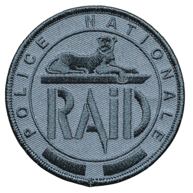 Abzeichen der französischen Nationalpolizei mit einem Löwen und der Aufschrift "RAID".