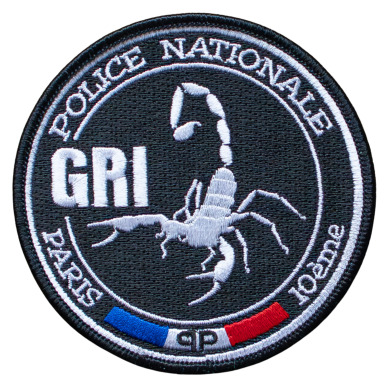 Abzeichen der französischen Polizei mit Skorpion-Symbol und den Worten "POLICE NATIONALE".